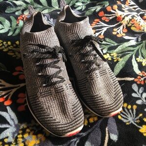 Under Armour running shoes. Used but in great condition. Size 8 women’s.